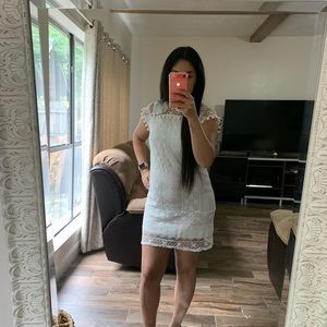 White dress with Pom Pom detail!